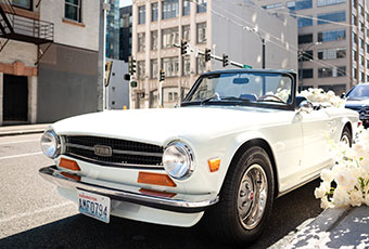 White convertible decorated with flowers