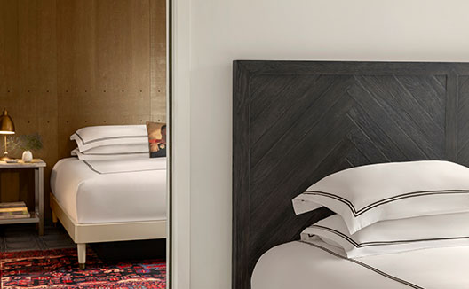 2 beds in different adjoining rooms